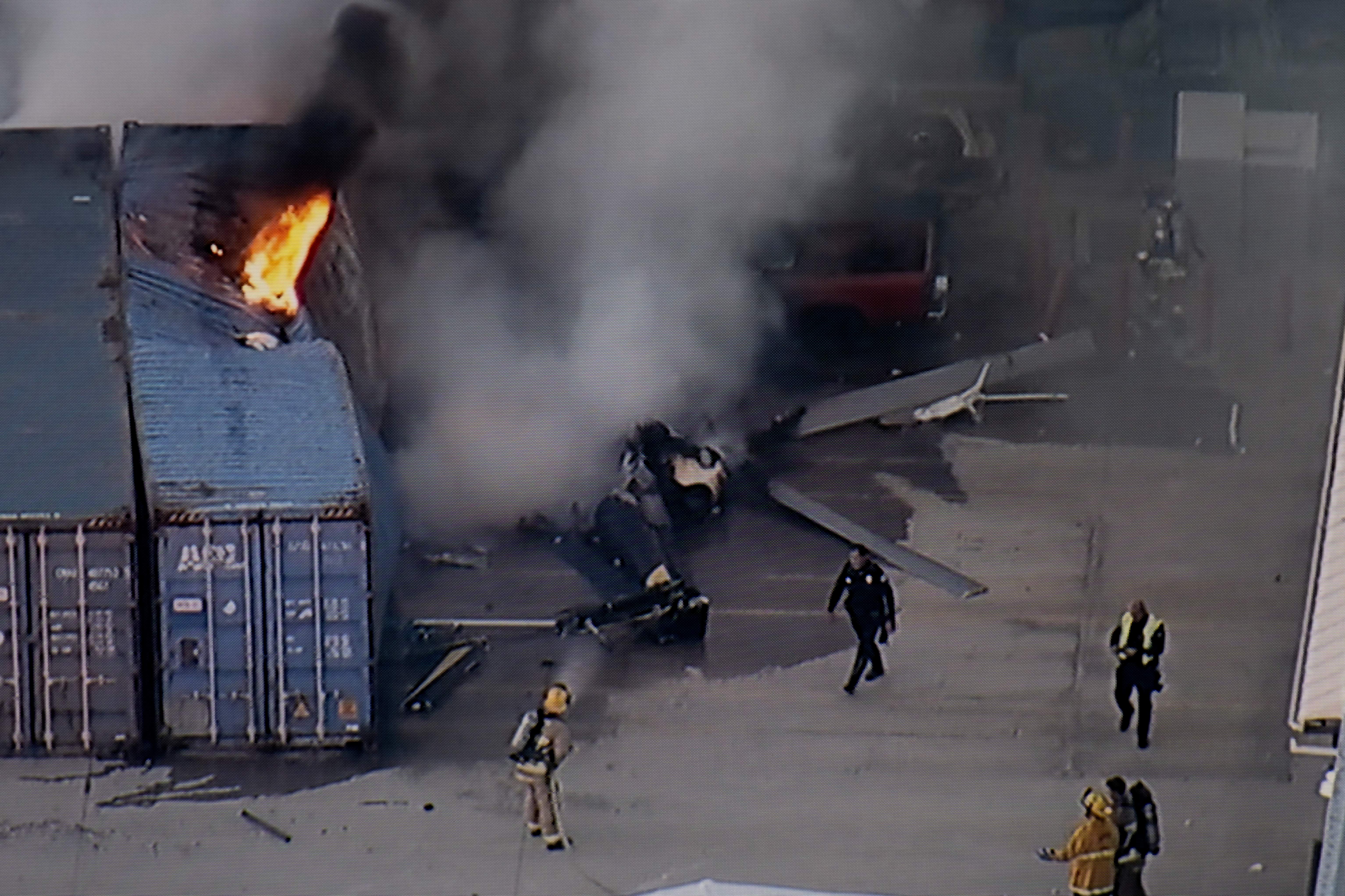 Helicopter crashes and bursts into flames, killing at least 3 people near an LA bus collision